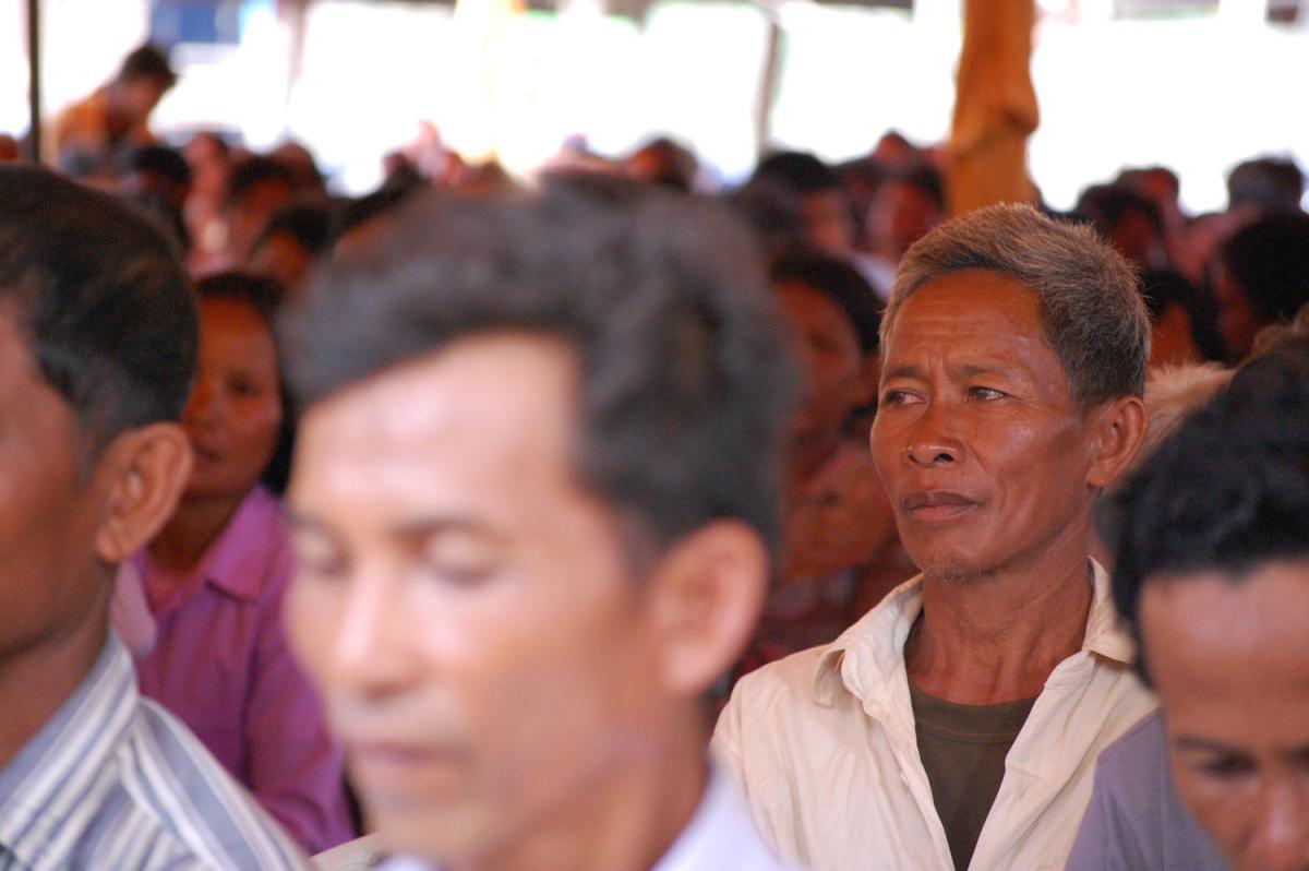 The intense focus on this individual, captured by Tassos Coulaloglou, senior program officer for NDI’s governance team, at a constituency dialogue in Srey Snam, Cambodia, shows us that democracy means the opportunity to participate. In the faintly blurred crowd, the faces of men, women and children are all represented. These events have allowed thousands of Cambodians to ask questions and voice concerns, as well as learn about their representatives’ responsibilities to constituents.