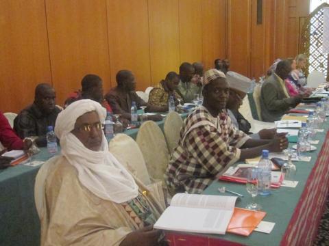 Members of the Malian National Assembly gather with representatives from the United Nations, foreign diplomatic missions and NDI staff to finalize key documents that will guide the defense and security committee's work from 2016 through 2018