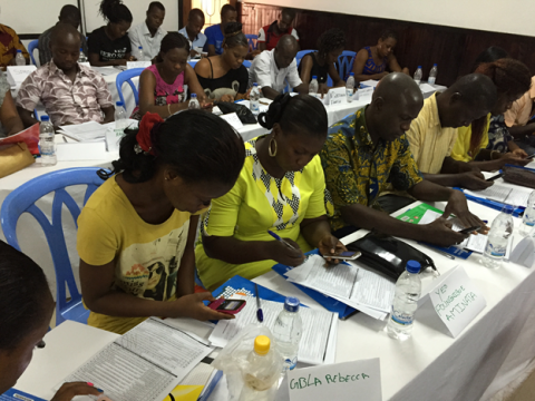 Observers in San Pedro, Côte d'Ivoire, practice sending coded text messages during a training on October 11 in preparation for the October 25 elections. Credit: Sarah Cooper