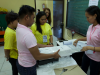 Election workers open balloting materials during the 2016 Philippines elections