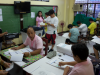 Voters in Mandaluyong, Philippines, mark their ballots during the 2016 national elections 